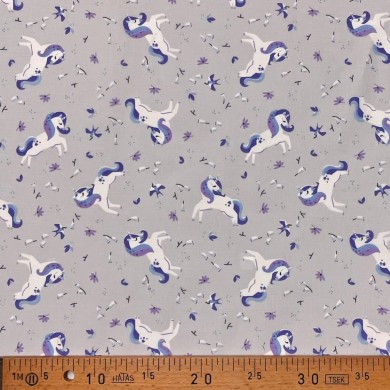 Tissu coton imprimé licorne violet clair Tissu coton imprimé licorne violet clair