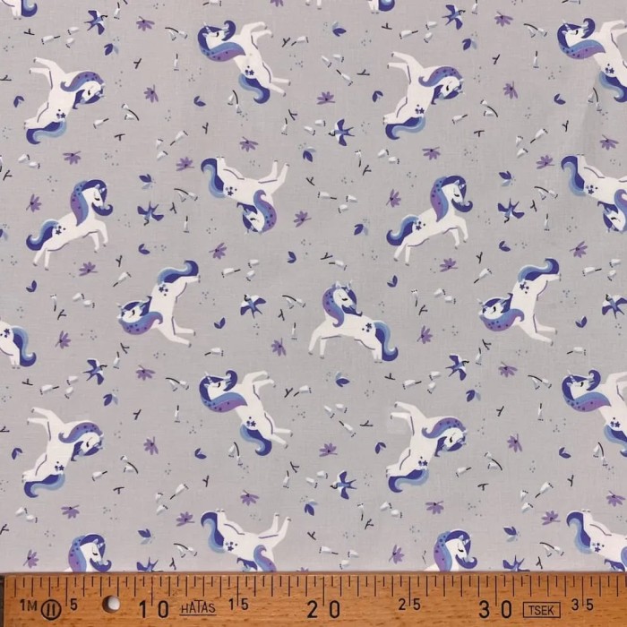 Tissu coton imprimé licorne violet clair