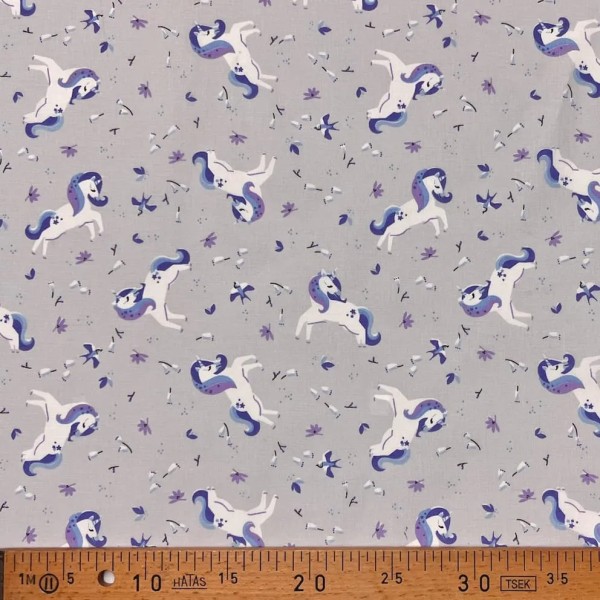 Tissu coton imprimé licorne violet clair Tissu coton imprimé licorne violet clair