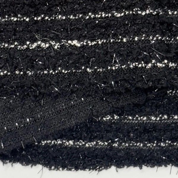 Tissu maille fantaisie polyester bouclé avec lurex rayures blanches sur noir Tissu maille fantaisie polyester bouclé avec lurex rayures blanches sur noir