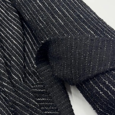 Tissu maille fantaisie polyester bouclé avec lurex rayures blanches sur noir