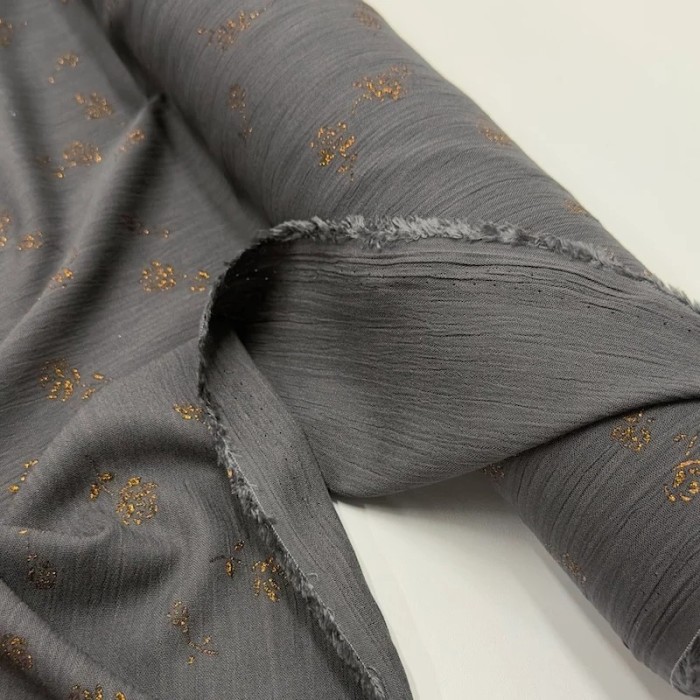 Tissu viscose décoré de roses en lurex cuivré sur anthracite Tissu viscose décoré de roses en lurex cuivré sur anthracite