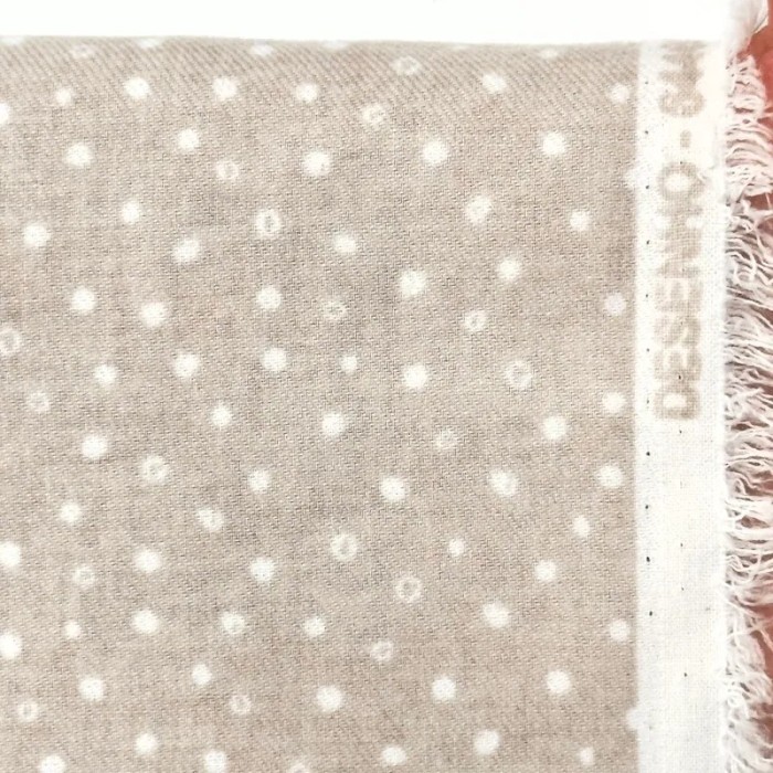 Tissu coton cretonne gratté petits pois blancs sur fond beige