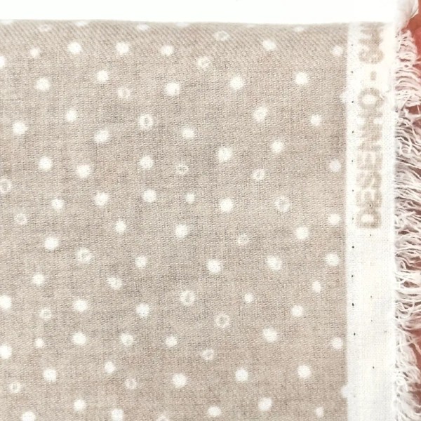 Tissu coton cretonne gratté petits pois blancs sur fond beige Tissu coton cretonne gratté petits pois blancs sur fond beige