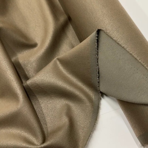 Tissu milano polyester viscose élasthanne effet satiné bronze Tissu milano polyester viscose élasthanne effet satiné bronze