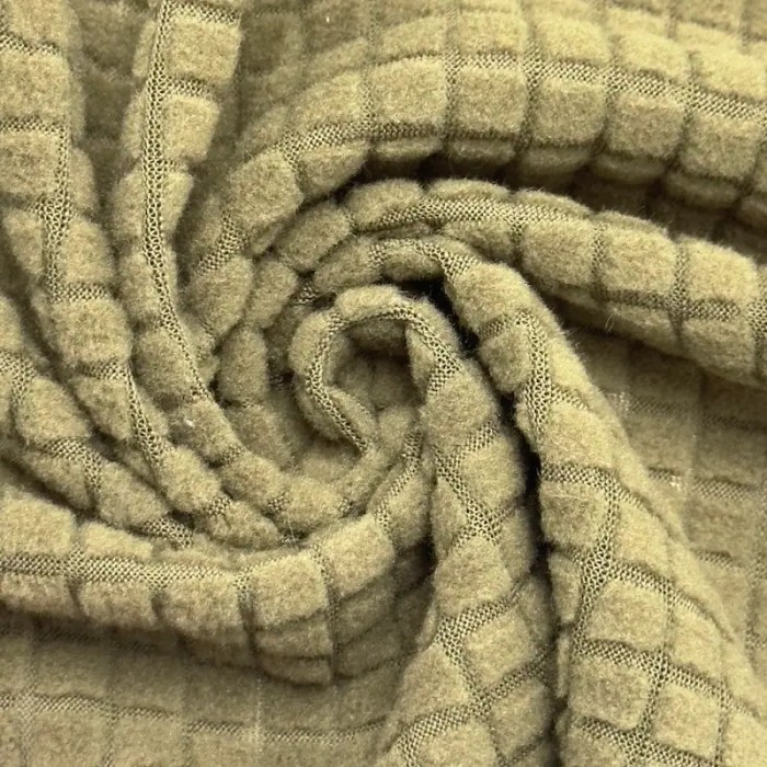 Tissu polyester relief à carreaux velouté vert sauge