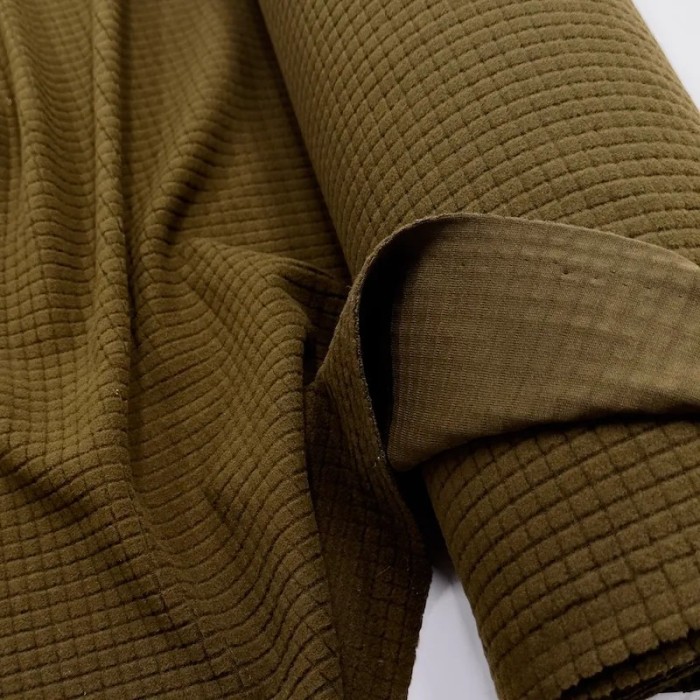 Tissu polyester relief à carreaux velouté kaki