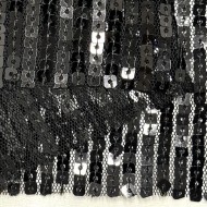 Tissu sequins brodé sur tulle polyester noir Tissu sequins brodé sur tulle polyester noir