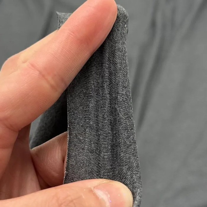 Tissu jersey polyester élasthanne uni gris foncé Tissu jersey polyester élasthanne uni gris foncé