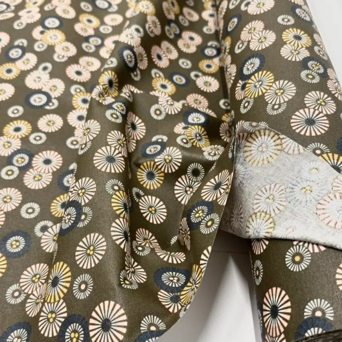 Tissu coton enduit soleil levant bronze