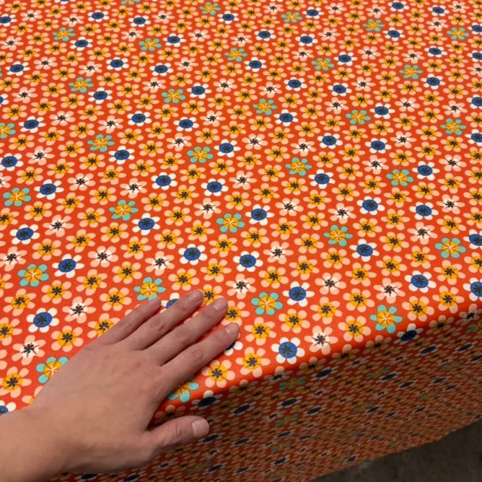 Tissu coton enduit Nami fleuri orange