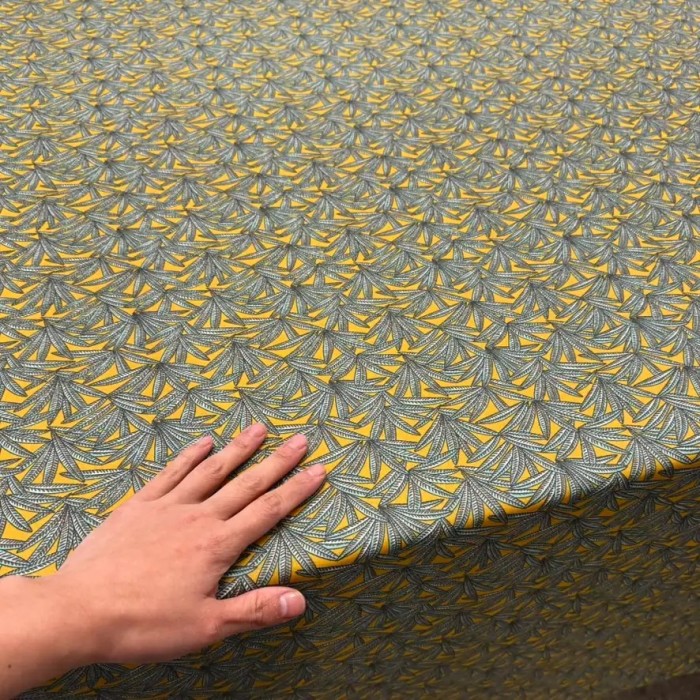 Tissu coton enduit Janaina Feuillages sur fond jaune