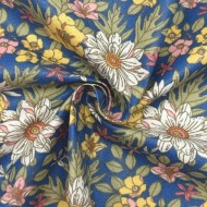 Tissu coton enduit Lolita fleuri multi-couleur sur bleu nuit