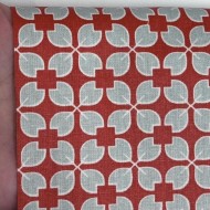 Tissu coton enduit Rodrigo géométrique bleu ciel sur rouge