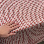 Tissu coton enduit Rodrigo géométrique bleu ciel sur rouge