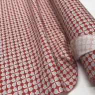 Tissu coton enduit Rodrigo géométrique bleu ciel sur rouge