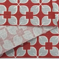 Tissu coton enduit Rodrigo géométrique bleu ciel sur rouge