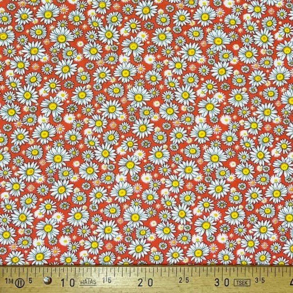 Tissu coton imprimé marguerite orange Tissu coton imprimé marguerite orange