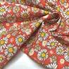 Tissu coton imprimé marguerite orange Tissu coton imprimé marguerite orange