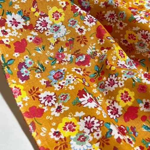 Tissu coton imprimé mille fleurs moutarde multi couleur