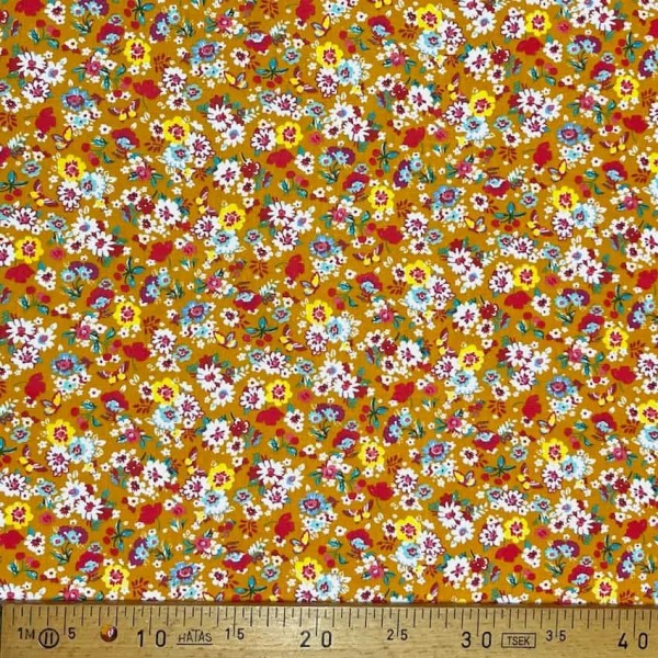 Tissu coton imprimé mille fleurs moutarde multi couleur Tissu coton imprimé mille fleurs moutarde multi couleur