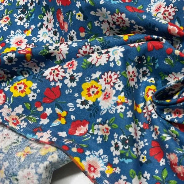 Tissu coton imprimé mille fleurs bleu multi couleur Tissu coton imprimé mille fleurs bleu multi couleur