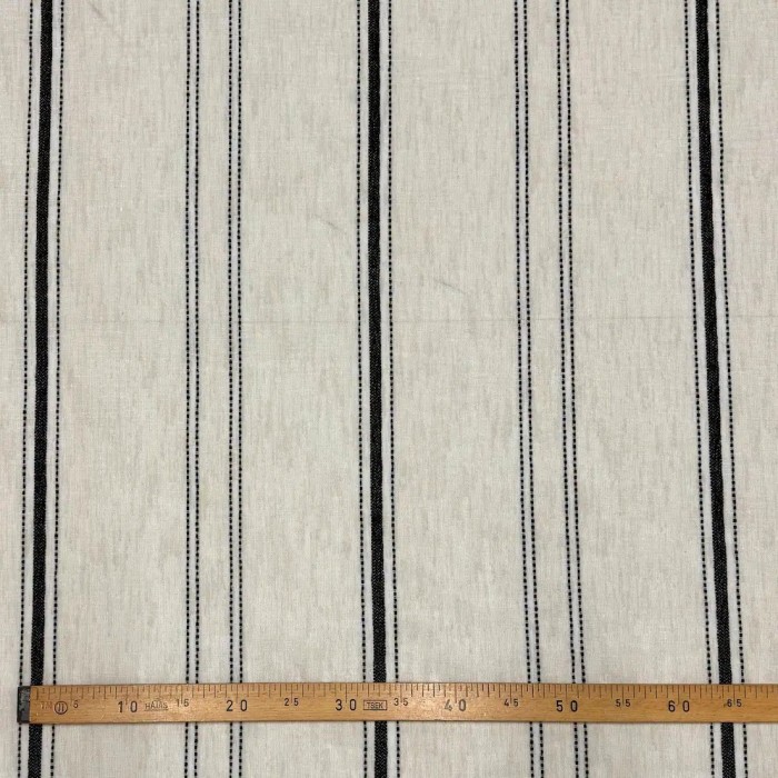 Tissu Voilage grand largeur polyester aspect lin à rayures noires sur voile beige