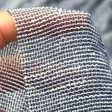 Tissu Voilage grand largeur polyester aspect lin uni bleu