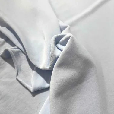 Tissu jersey coton polyester velours bleu ciel uni - Marque française