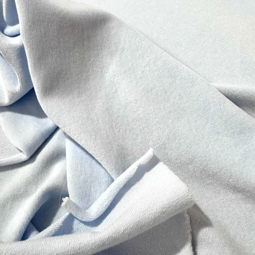 Tissu jersey coton polyester velours bleu ciel uni - Marque française