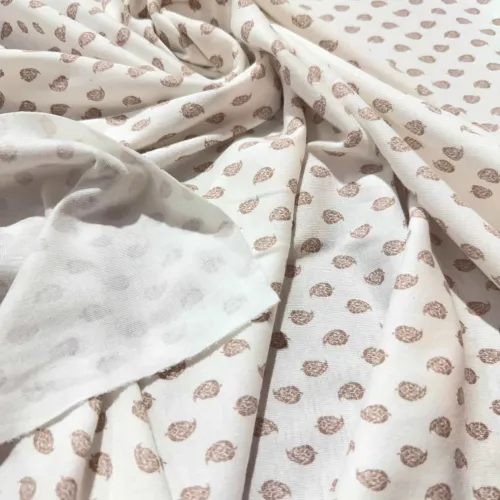 Tissu jersey coton à feuille marron - Marque française
