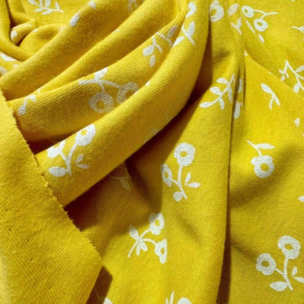 Tissu jersey coton fleurs jaune - Marque française Tissu jersey coton fleurs jaune - Marque française
