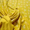 Tissu jersey coton fleurs jaune - Marque française Tissu jersey coton fleurs jaune - Marque française