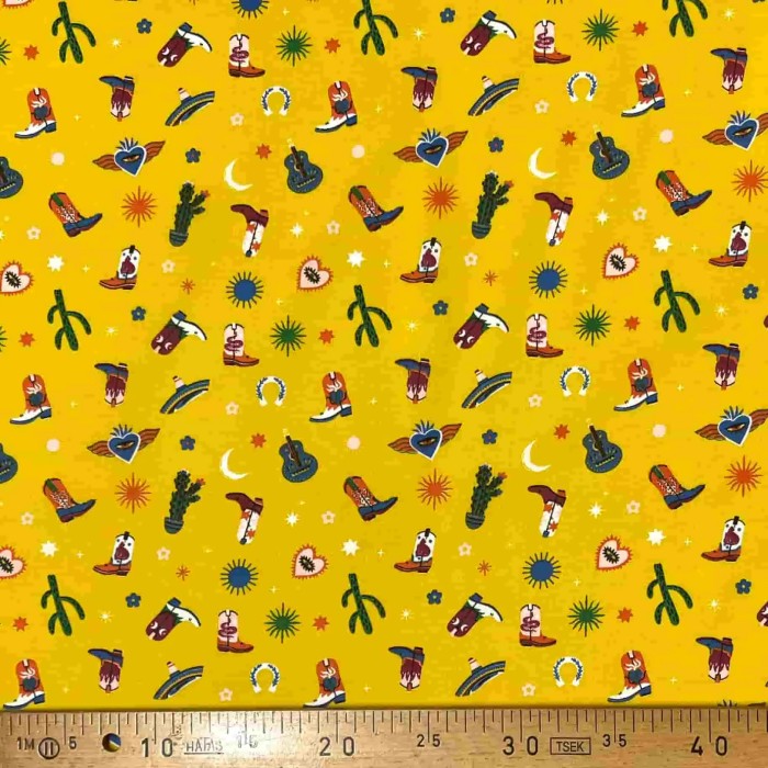 Tissu coton imprimé Santiags jaune