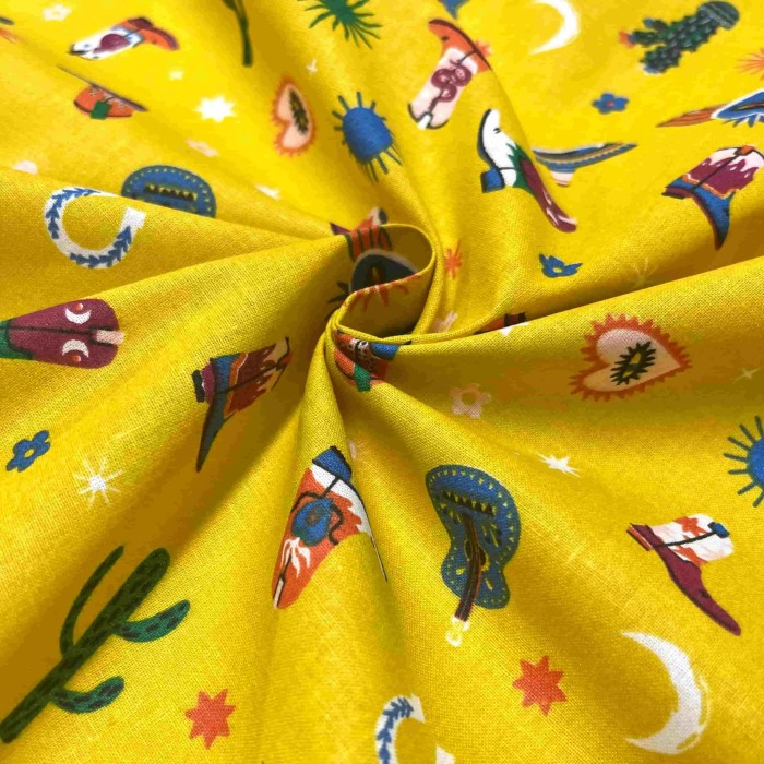 Tissu coton imprimé Santiags jaune