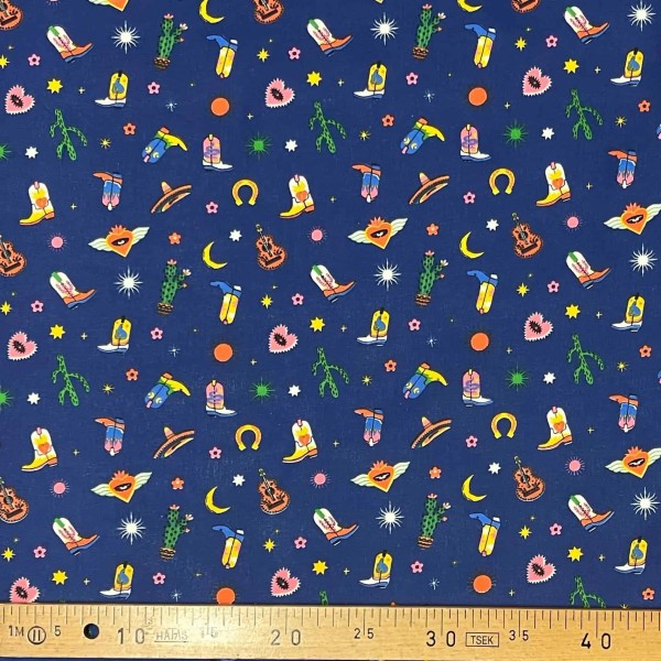 Tissu coton imprimé Santiags bleu Tissu coton imprimé Santiags bleu