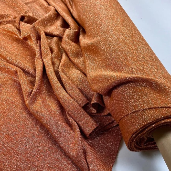 Tissu polyester maille lurex orange uni Tissu polyester maille lurex orange uni