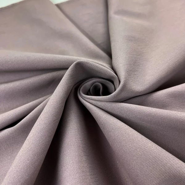 Tissu coton stretch mauve uni Tissu coton stretch mauve uni