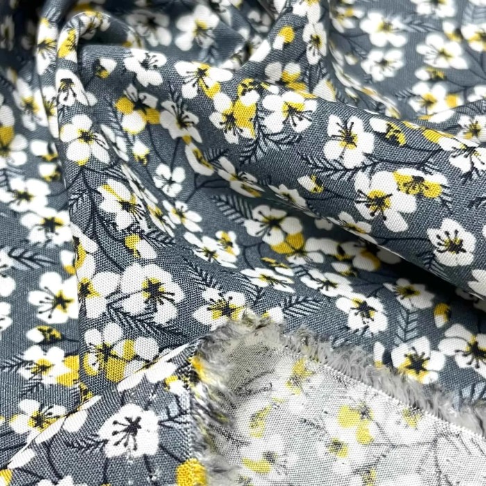 Tissu viscose petite fleurs gris