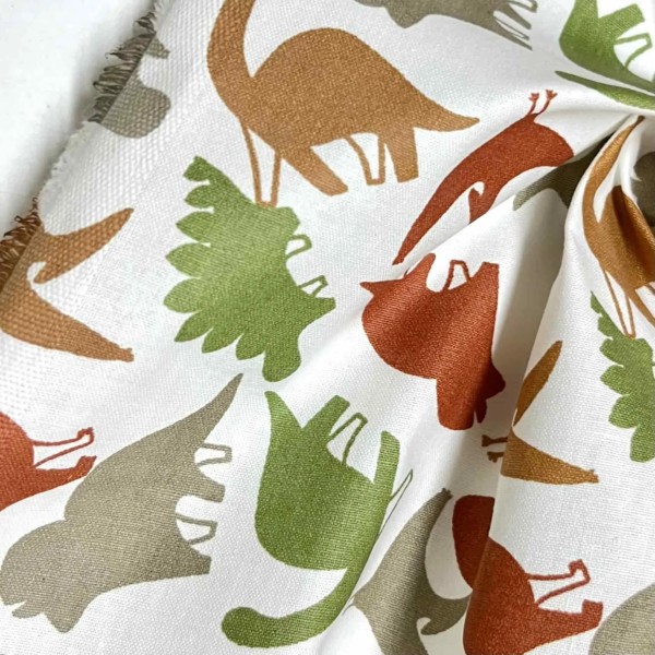 Tissu coton imprimé Dinau vert marron Tissu coton imprimé Dinau vert marron