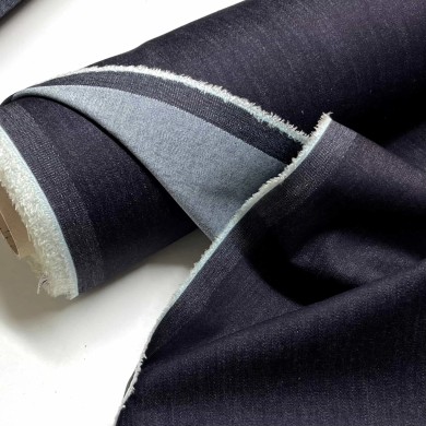 Tissu jeans lourd brut très extensible et fin
