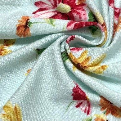 Tissu jersey coton viscose stretch fleurs d'été turquoise Tissu jersey coton viscose stretch fleurs d'été turquoise