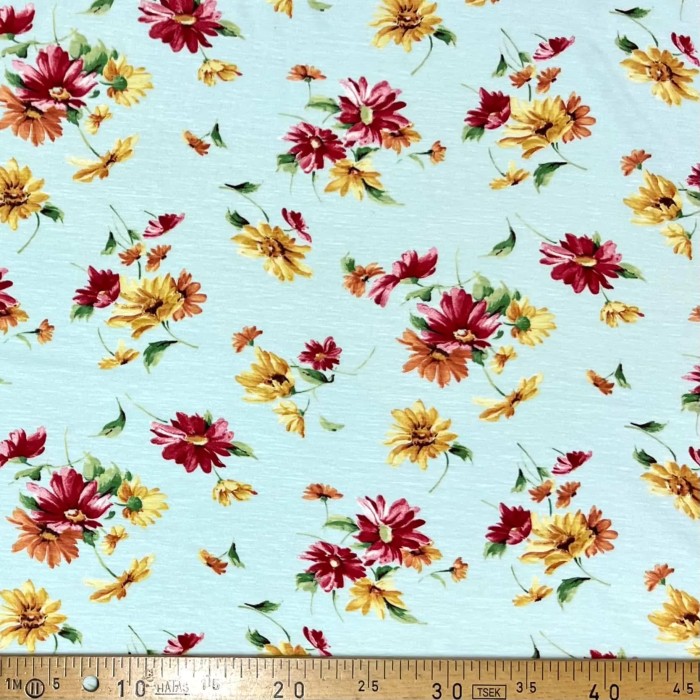 Tissu jersey coton viscose stretch fleurs d'été turquoise Tissu jersey coton viscose stretch fleurs d'été turquoise