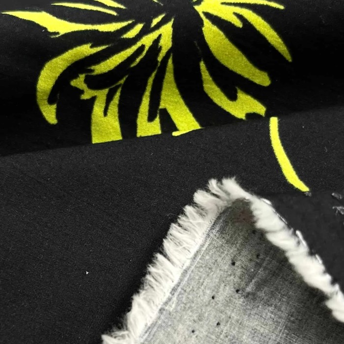 Tissu coton Flamme jaune sur fond noir