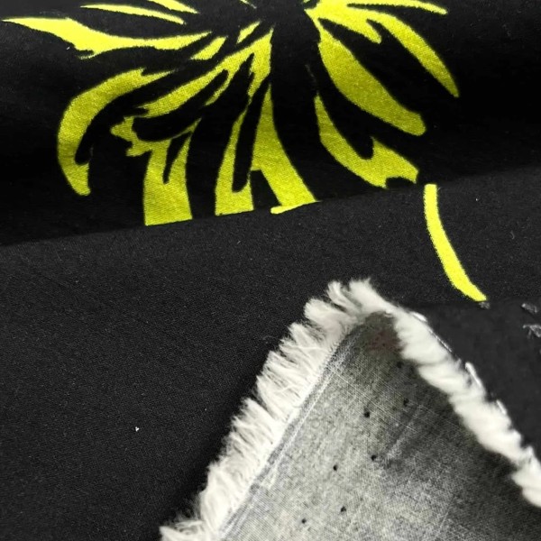 Tissu coton Flamme jaune sur fond noir Tissu coton Flamme jaune sur fond noir