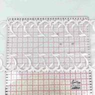 Dentelle brodée sur maille fine vagues blanches 20cm