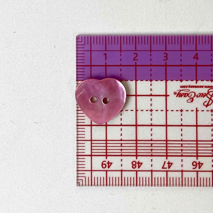 Bouton nacre cœur rose