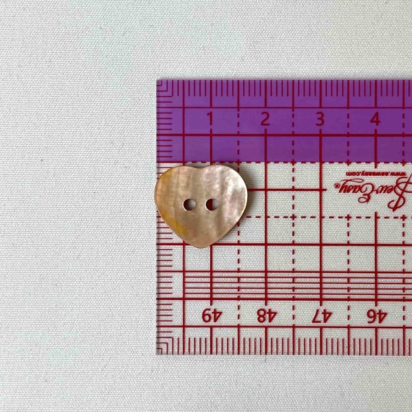 Bouton nacre cœur orange Bouton nacre cœur orange