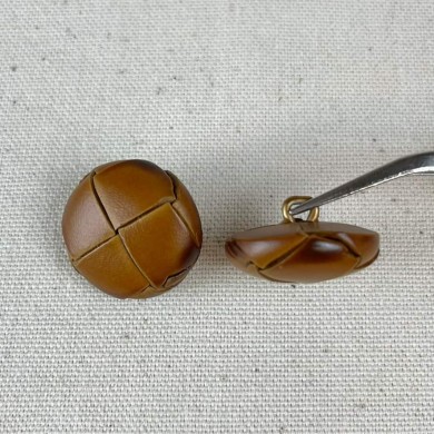 Bouton en cuir nœud marron 27mm Bouton en cuir nœud marron 27mm