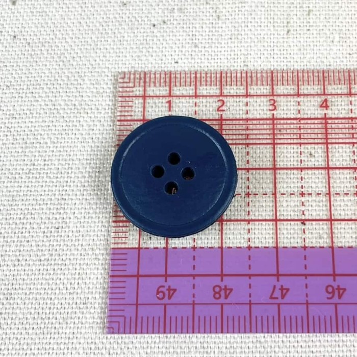 Bouton en cuir bleu marine 4 trous 23mm